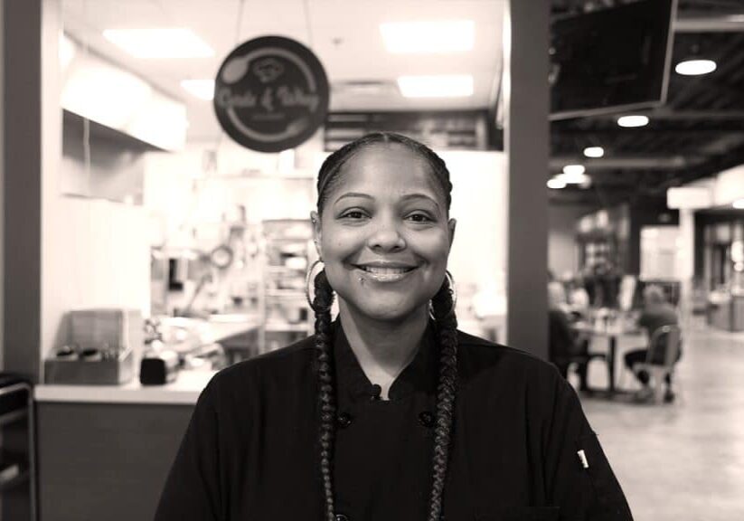 TEDC_BorrowerMainImages_010524_CurdsWhey Chef/Owner of Curds and Whey, Faith Walker, smiling in restaurant